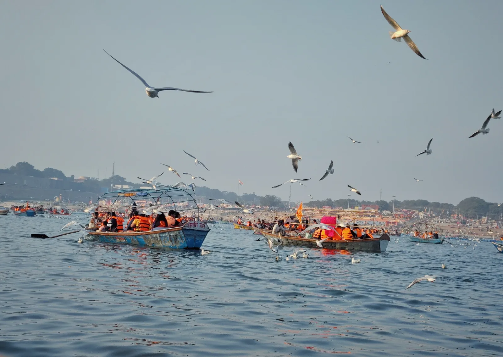 Boats and pilgrims on the waters at Prayagraj during Maha Kumbh 2025