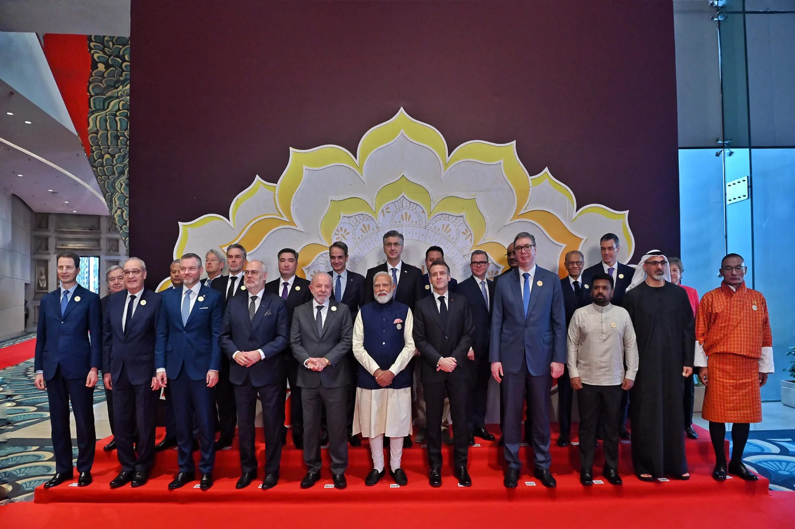 World leaders pose for a group photograph at the opening ceremony of the India AI Impact Summit at Bharat Mandapam, New Delhi, on 19 February 2026