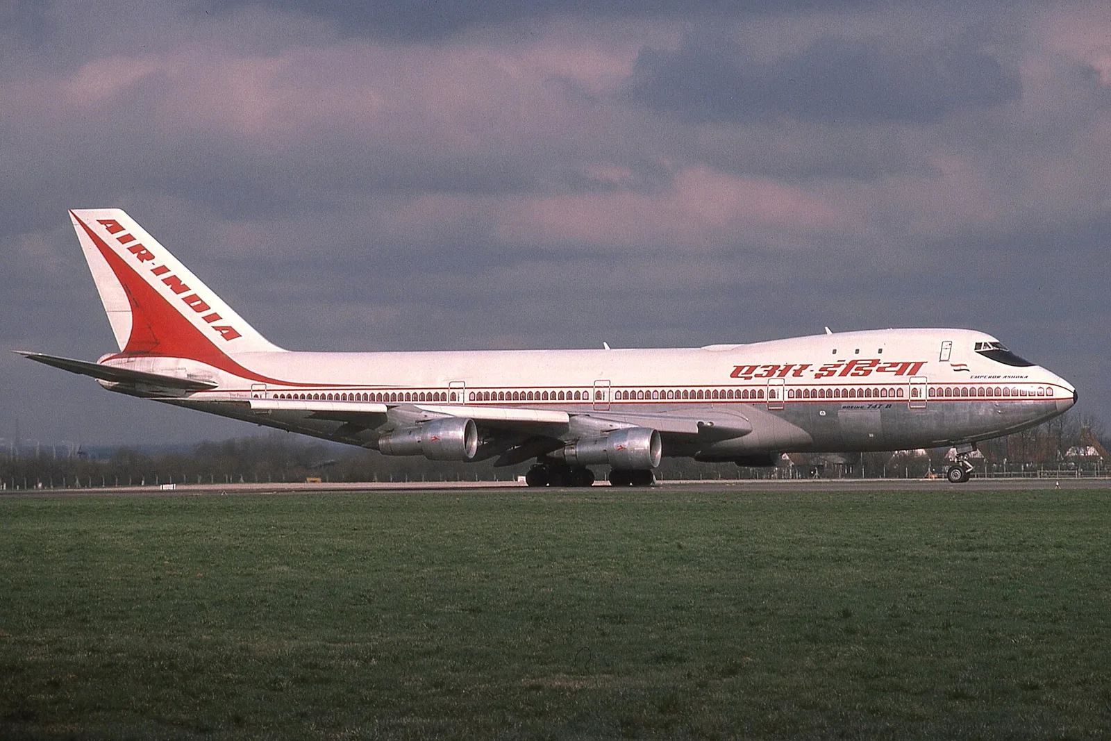 Air India Flight 855, a Boeing 747 passenger jet, crashes into the ocean near Bombay, killing 213: Actual Air India Boeing 747 VT-EBD, Emperor Ashoka, photographed at Heathrow on 27 February 1977, ten months before its 1978 crash; not the crash scene.