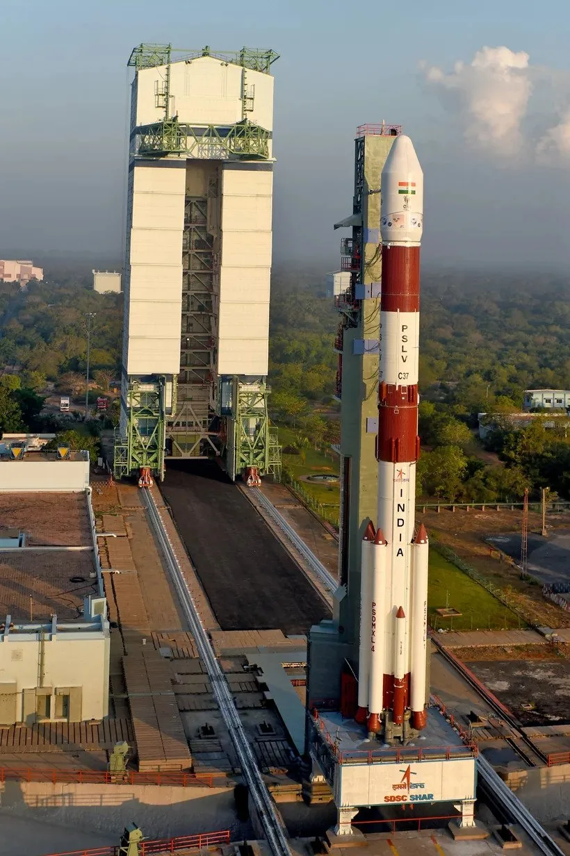 ISRO launches 104 satellites in one mission: PSLV-C37 fully integrated with its mobile service tower, associated with the 2017 multi-satellite mission; not a liftoff frame.
