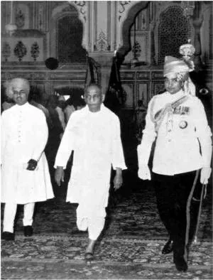 Greater Rajasthan is formally inaugurated: Archival photograph of Vallabhbhai Patel departing Durbar Hall after the Rajasthan Union inauguration, accompanied by the rulers of Jaipur and Kotah. Relevant to the 1949 creation of Greater Rajasthan.