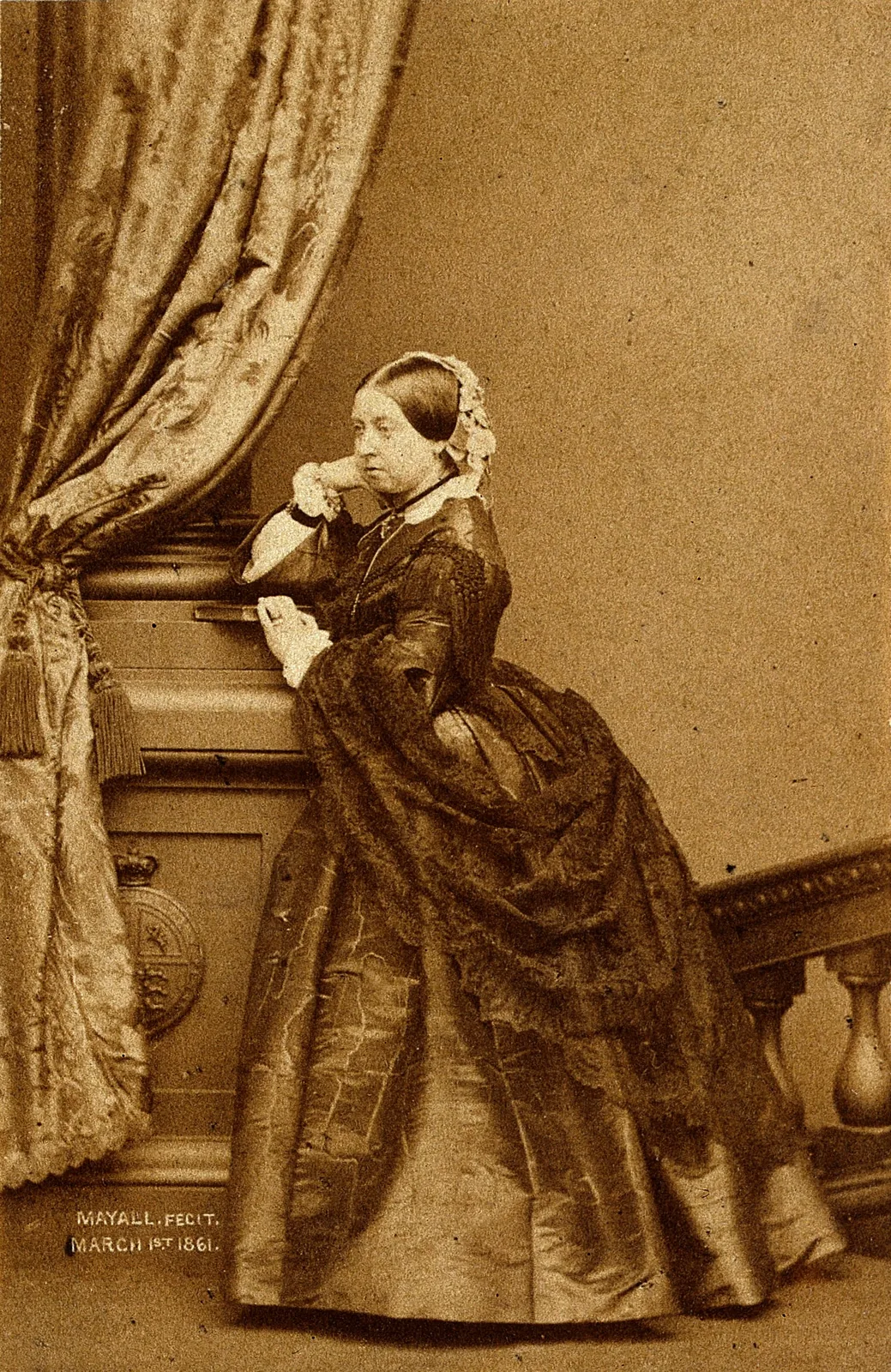 Queen Victoria takes the title Empress of India: A historic studio portrait identifying Queen Victoria as Empress of India. It does not depict the parliamentary title legislation or proclamation in 1876.