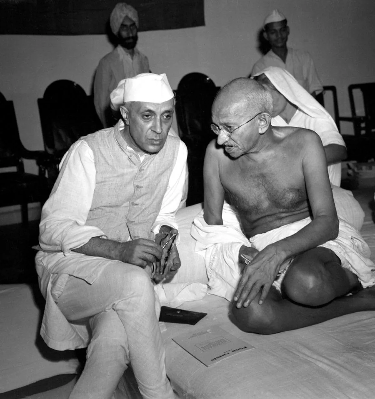 Nehru is elected leader of the Congress Party in India: Gandhi and Jawaharlal Nehru at an All-India Congress committee meeting in Bombay on 6 July 1946, when Nehru assumed party leadership. Exact-period photo, rather than a later memorial.