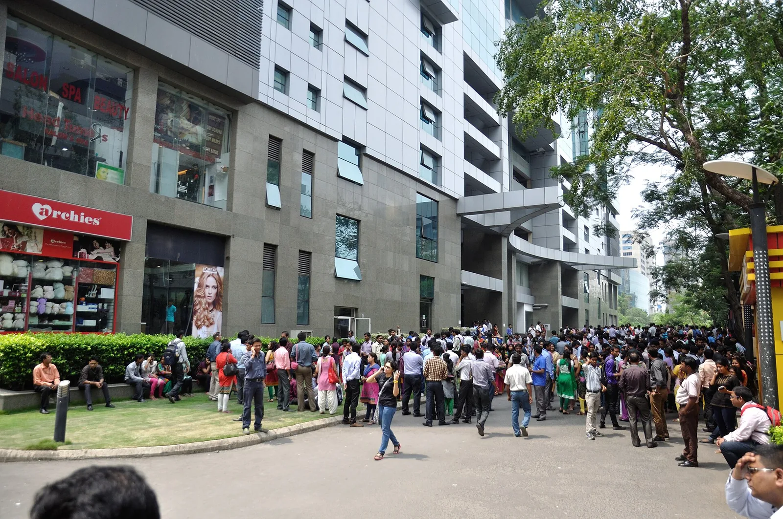 A second major earthquake in Nepal, measuring 7: People evacuating high-rise offices in Kolkata following the magnitude 7.3 Nepal earthquake on 12 May 2015. Taken in India, not at the Nepal epicentre; photographed that same day.