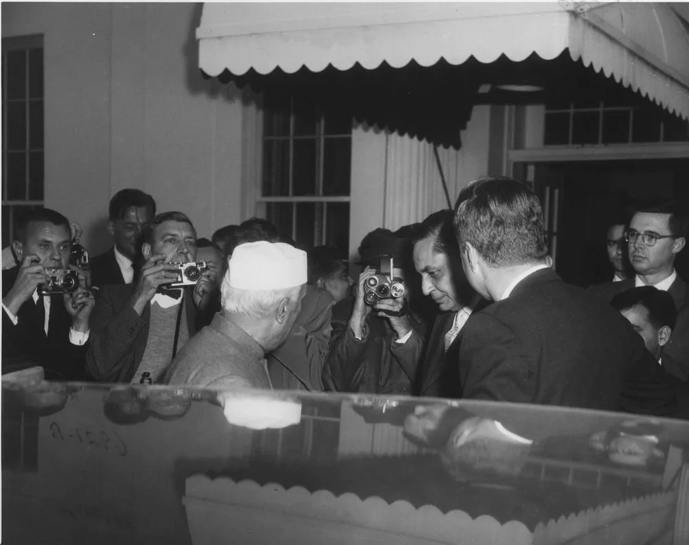 Prime Minister of India Jawaharlal Nehru dies: Photograph of Prime Minister Jawaharlal Nehru departing the White House after meeting President Kennedy on 9 November 1961; does not depict his death in May 1964.