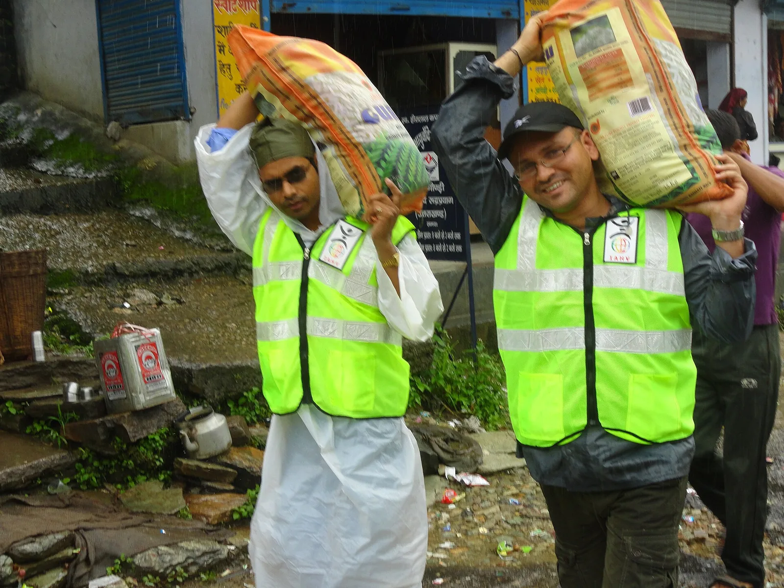 Flash floods and landslides in the Indian states of Uttarakhand and Himachal Pradesh kill more…: Relief work photographed in Uttarakhand on 8 July 2013 after the June floods. This is flood aftermath, not the original landslide or flash-flood moment.