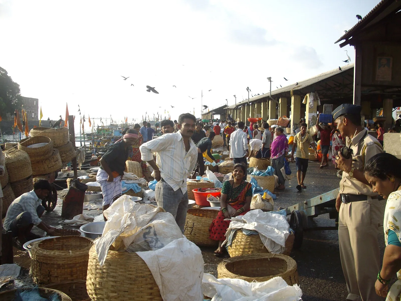 The Indian passenger ship Ramdas is capsized by a cyclone at Mumbai, India, with 625 people killed: 2011 photograph of historic Mumbai docks near the maritime setting of the SS Ramdas sinking of 1947; not a photograph of the ship, the cyclone or rescue.