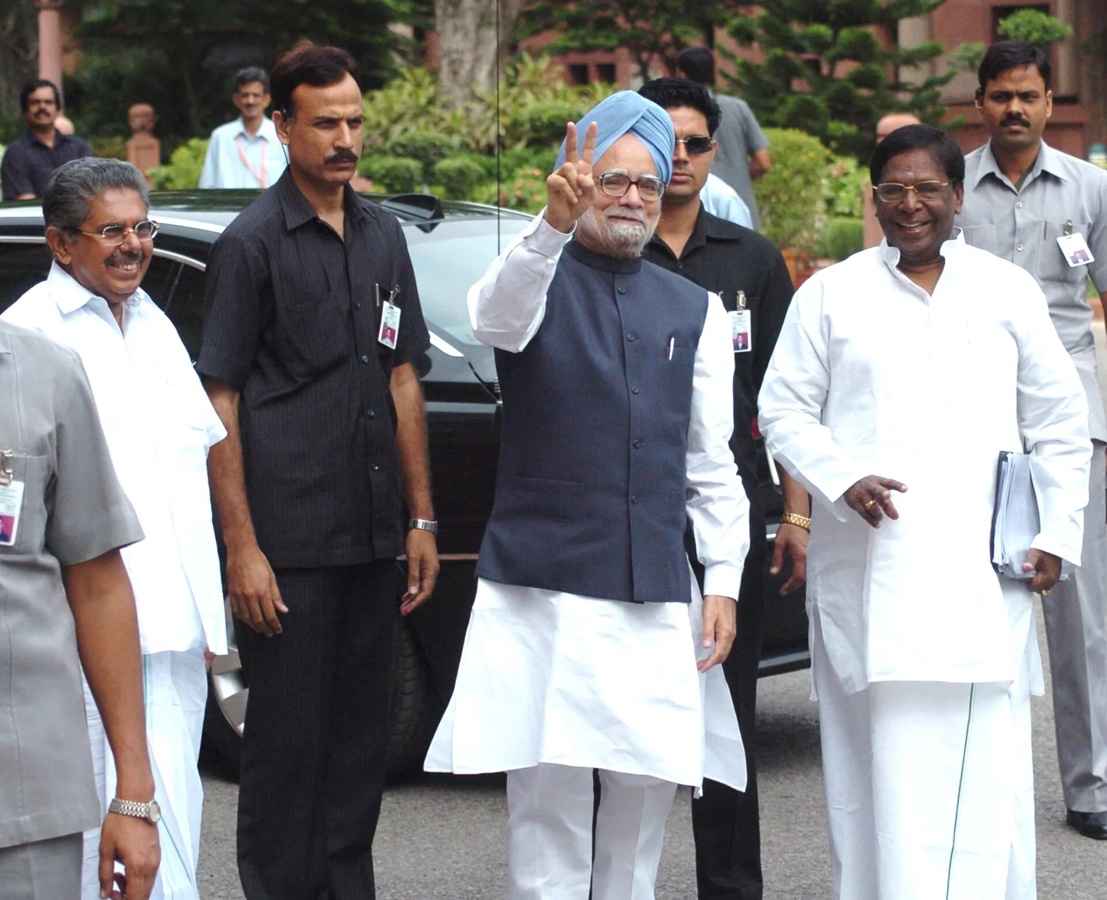 The United Progressive Alliance-led government in India survives a crucial no-confidence vote,…: Prime Minister Manmohan Singh arriving at Parliament House on 21 July 2008 before the UPA confidence vote on 22 July. Not a photograph of the voting proceedings.