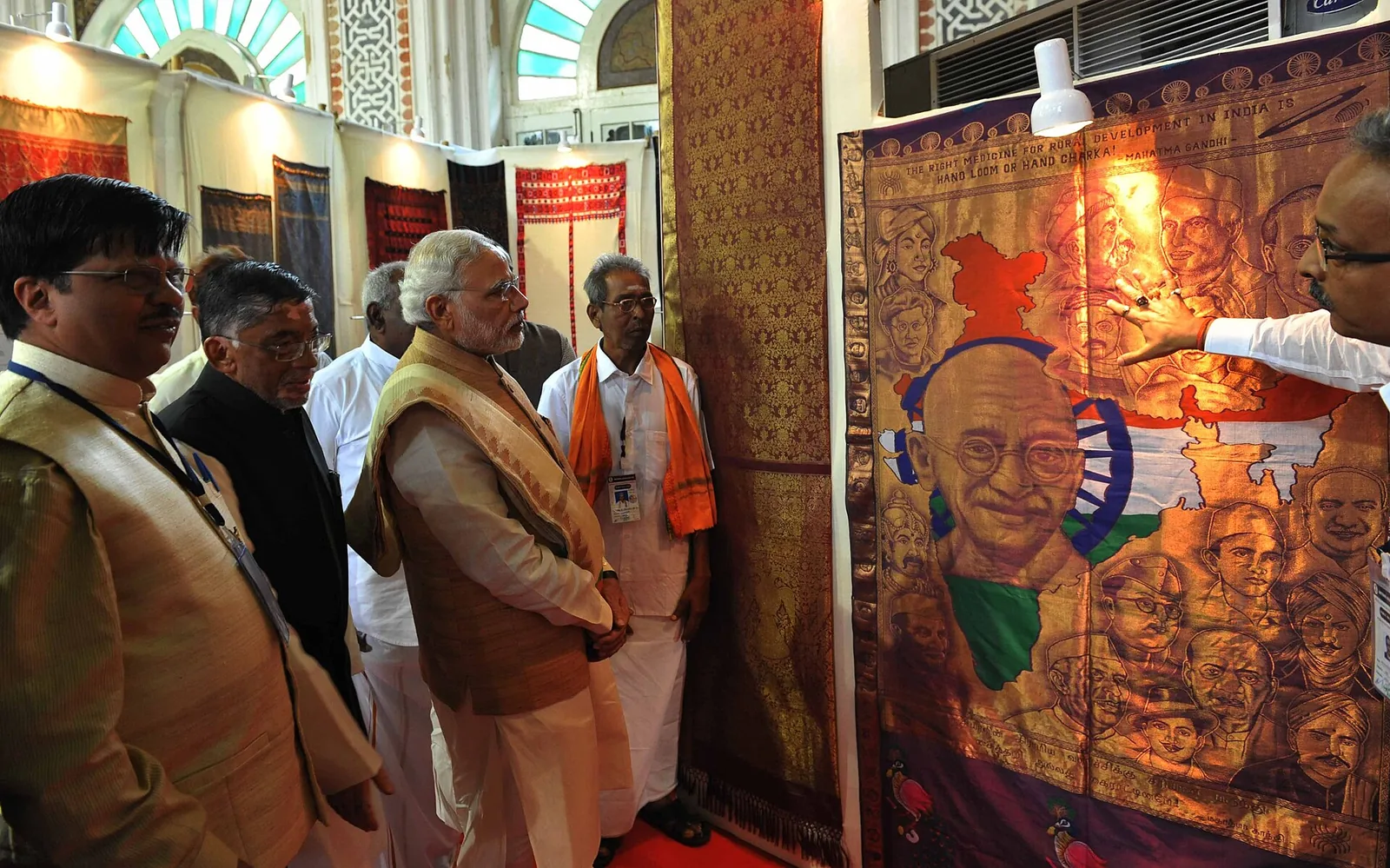 First National Handloom Day: Prime Minister Narendra Modi at the first National Handloom Day celebrations, held at the University of Madras Senate House in Chennai on 7 August 2015. The image depicts the event.