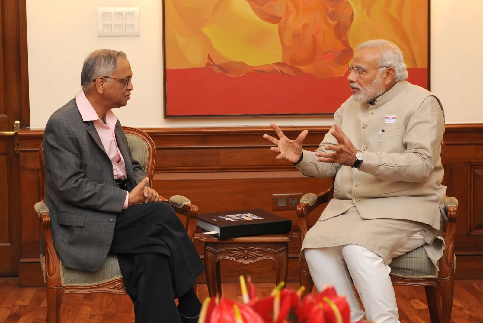 Birth of N. R. Narayana Murthy: A 2014 photograph of N. R. Narayana Murthy meeting Narendra Modi; not an image from Murthy's birth in 1946.