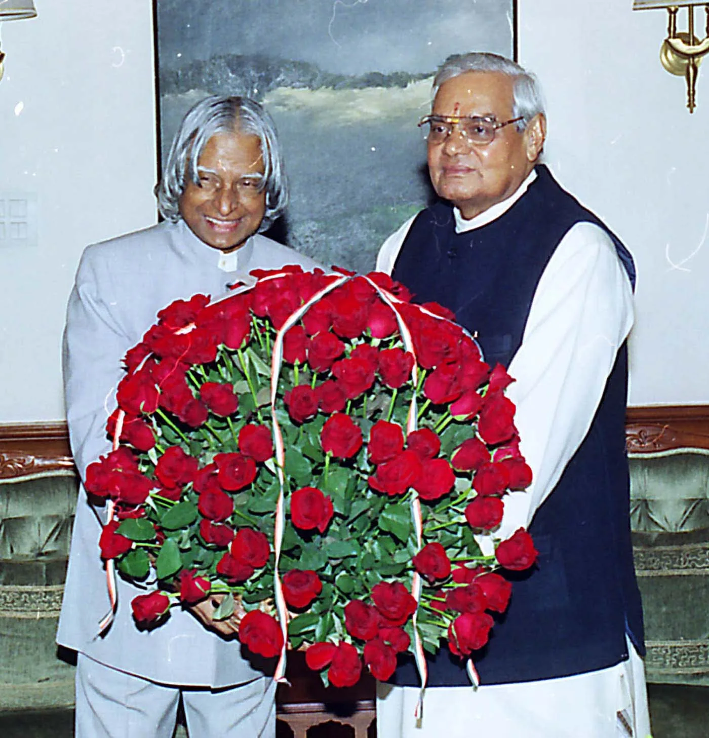 Birth of Atal Bihari Vajpayee is born: A 2003 birthday greeting between A. P. J. Abdul Kalam and Atal Bihari Vajpayee; not a photograph of Vajpayee's birth in 1924.
